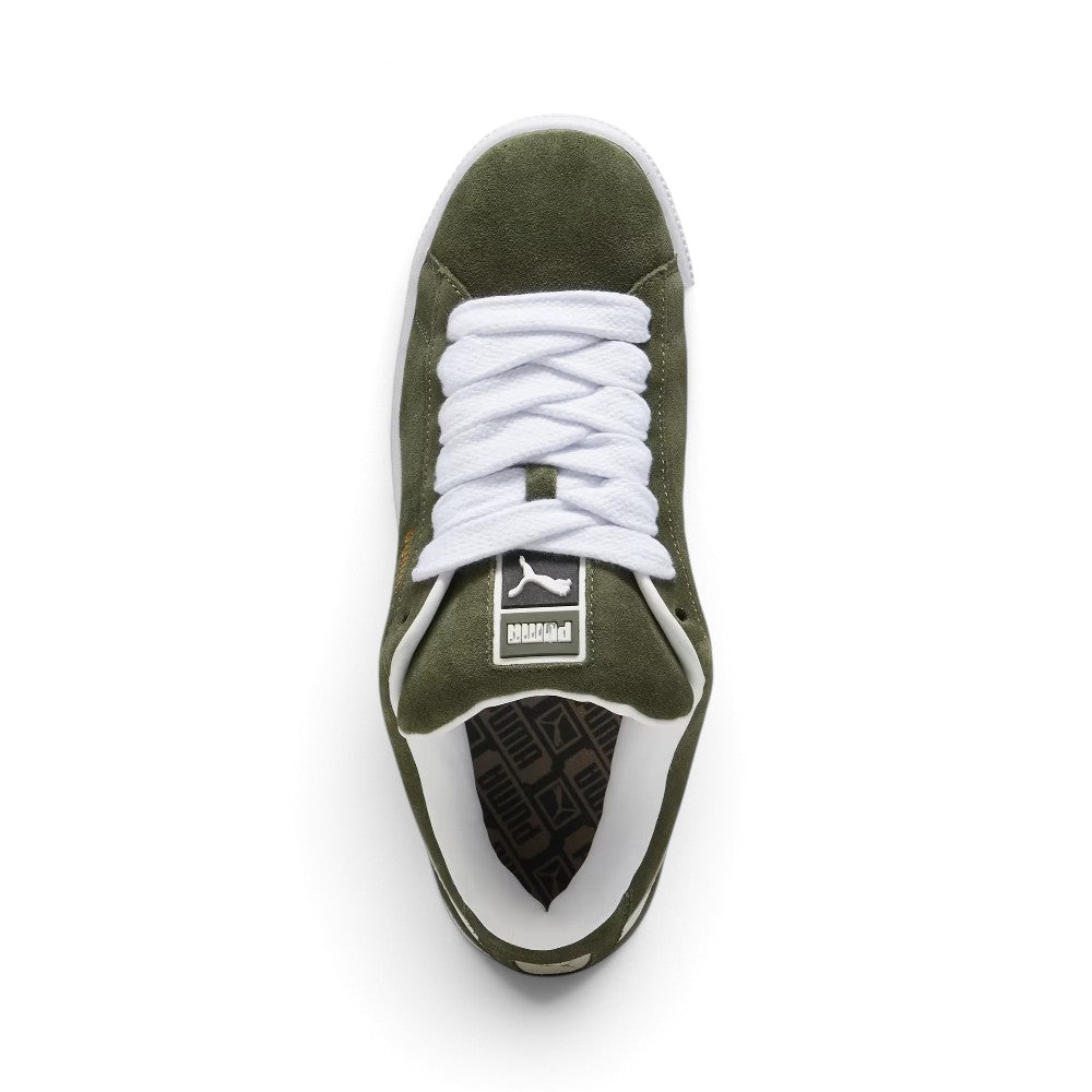 Overhead look at the shoe highlighting the Dark Olive suede toe box, ultra-wide lacing throat with chunky white fat laces, heavily padded foam tongue with retro PUMA woven label, and plush white interior collar lining.