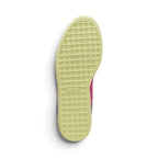 Full-length bottom profile showing the pale yellow rubber outsole, displaying the signature cross-hatch traction pattern, perimeter flex grooves, and central recessed PUMA logo bridge.