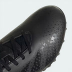Zoom looking at the front of the shoes and laces, highlighting the subtle texture on the striking zone.