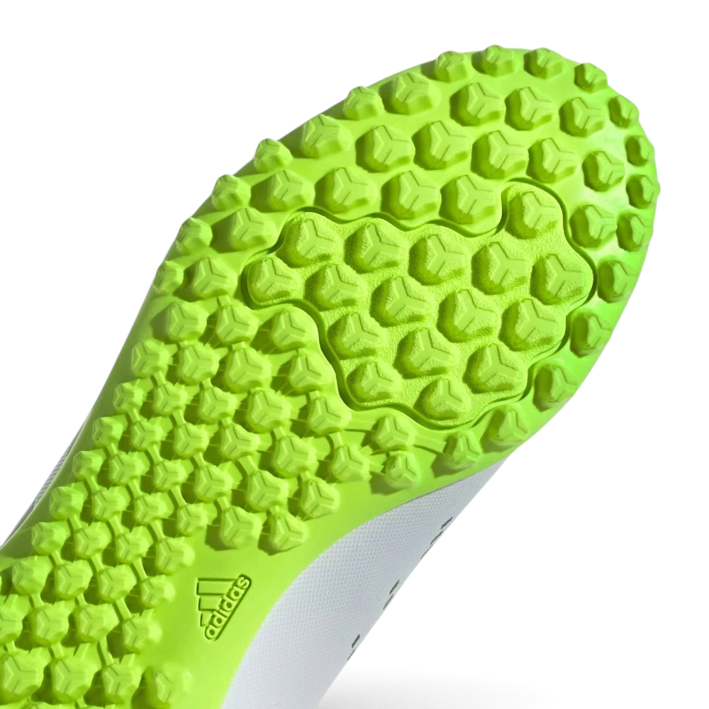 Close-up of a green textured sole with Adidas logo on a white background