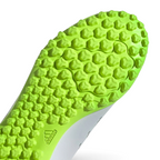Close-up of a green textured sole with Adidas logo on a white background