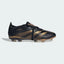 The Black and Gold Bellingham Predator, highlighting the metallic gold 3-Stripes and the distinctive Jude Bellingham logo on the heel.