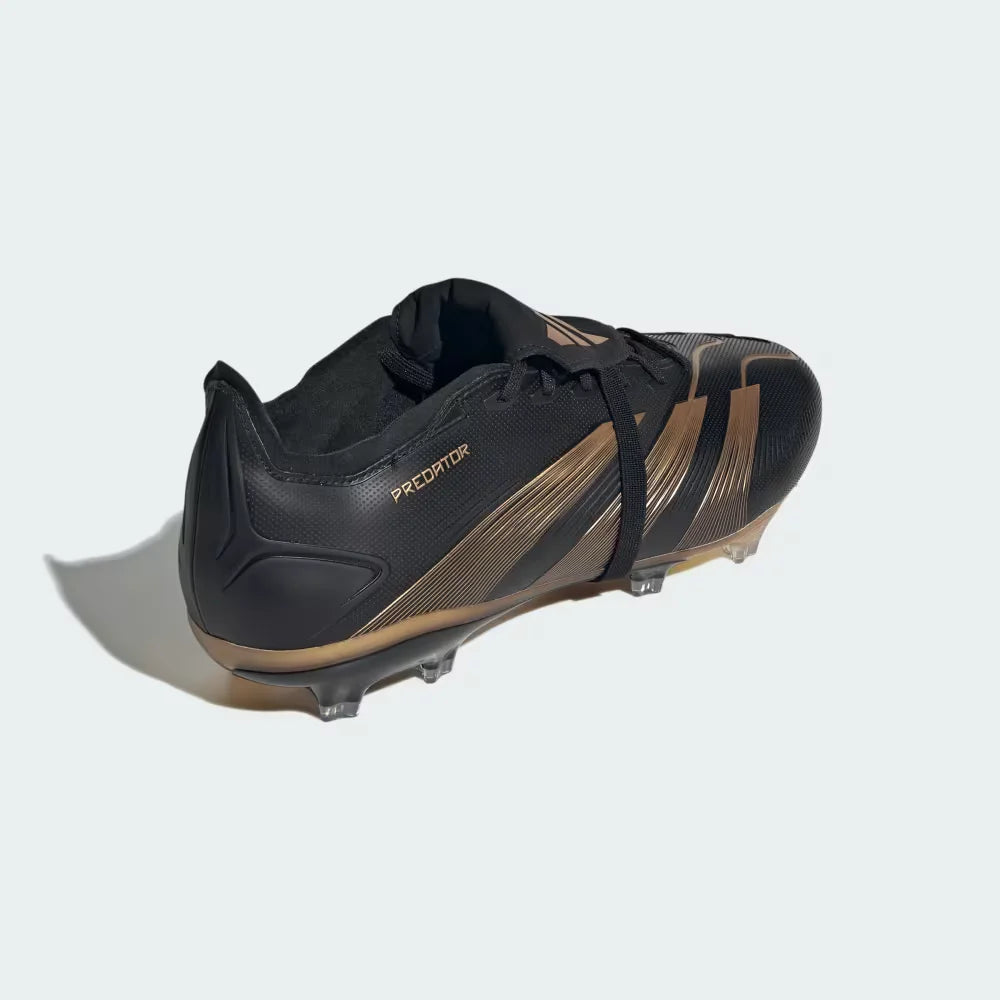 Focusing on the reinforced heel construction and the metallic gold detailing.