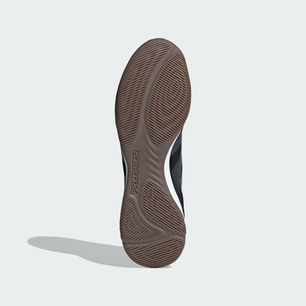 Displays the technical non-marking rubber tread designed for unreal indoor grip.