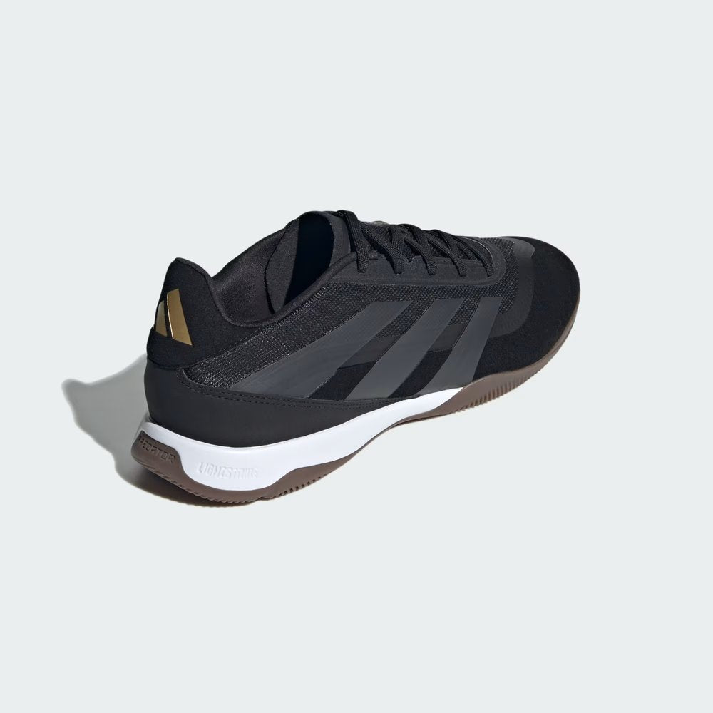 Focuses on the Lightstrike branding and the professional finish of the heel structure.