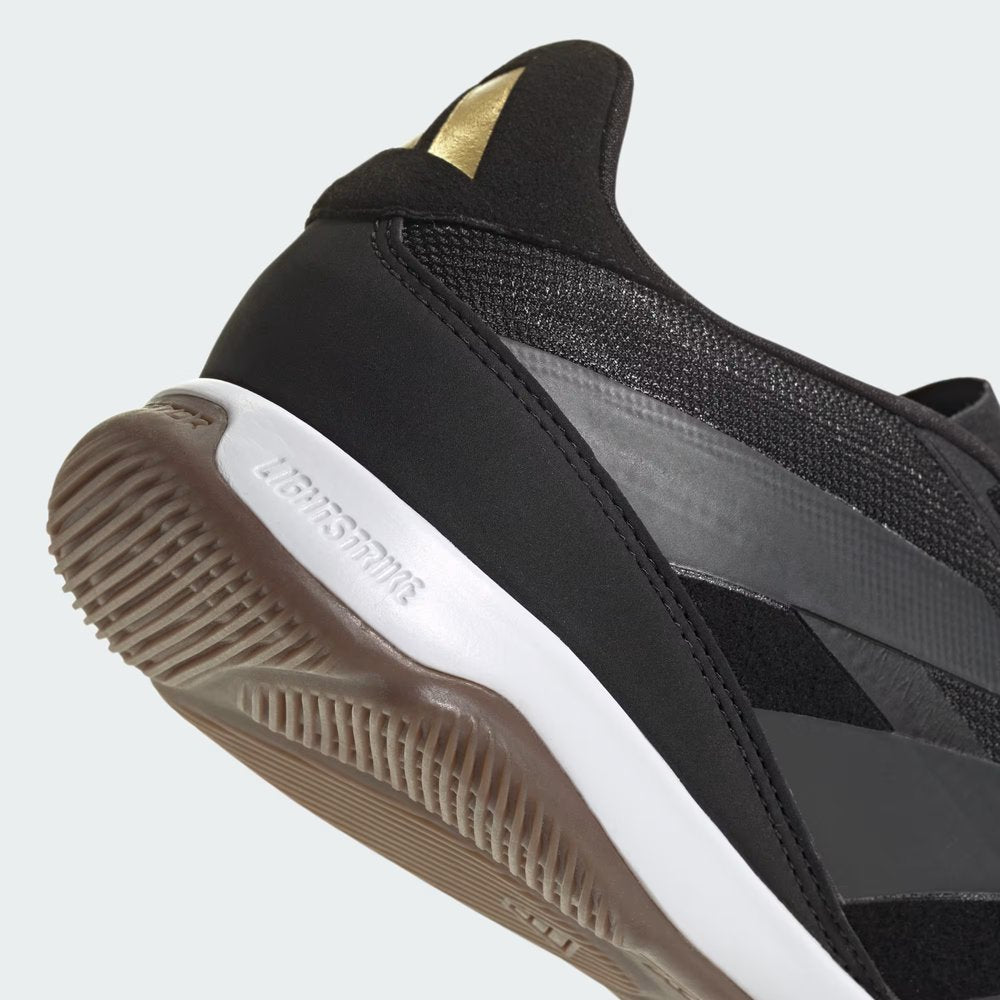Highlights the technical Lightstrike foam and the "unreal" finish of the court-ready rubber.