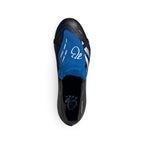 Overhead view looking down at the laced football boots, displaying the bright blue fold-over tongue secured by an elastic strap, featuring custom Jude Bellingham signature graphics across the top.