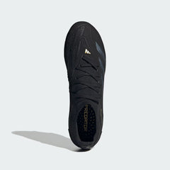 Top-down view of a pair of Adidas Predator Pro FG men's football boots in black, highlighting their streamlined silhouette and Primeknit collar.