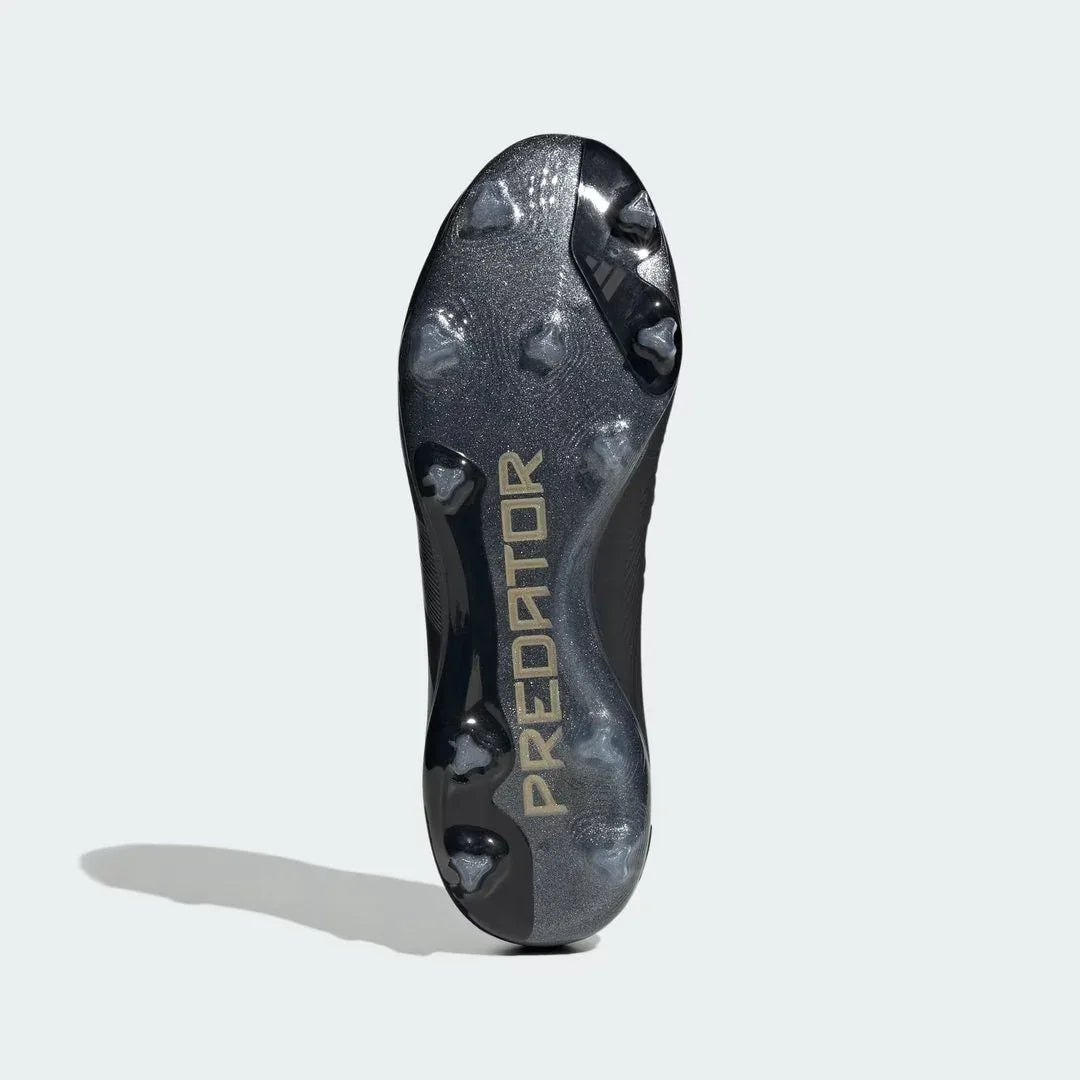 View of the outsole of the Adidas Predator Pro FG men's boots, showing the Controlframe soleplate and hybrid studs for firm ground traction.