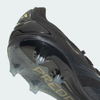 Detailed zoom on the sole of the Adidas Predator Pro FG men's boots, highlighting the firm ground stud pattern and the Controlframe technology.