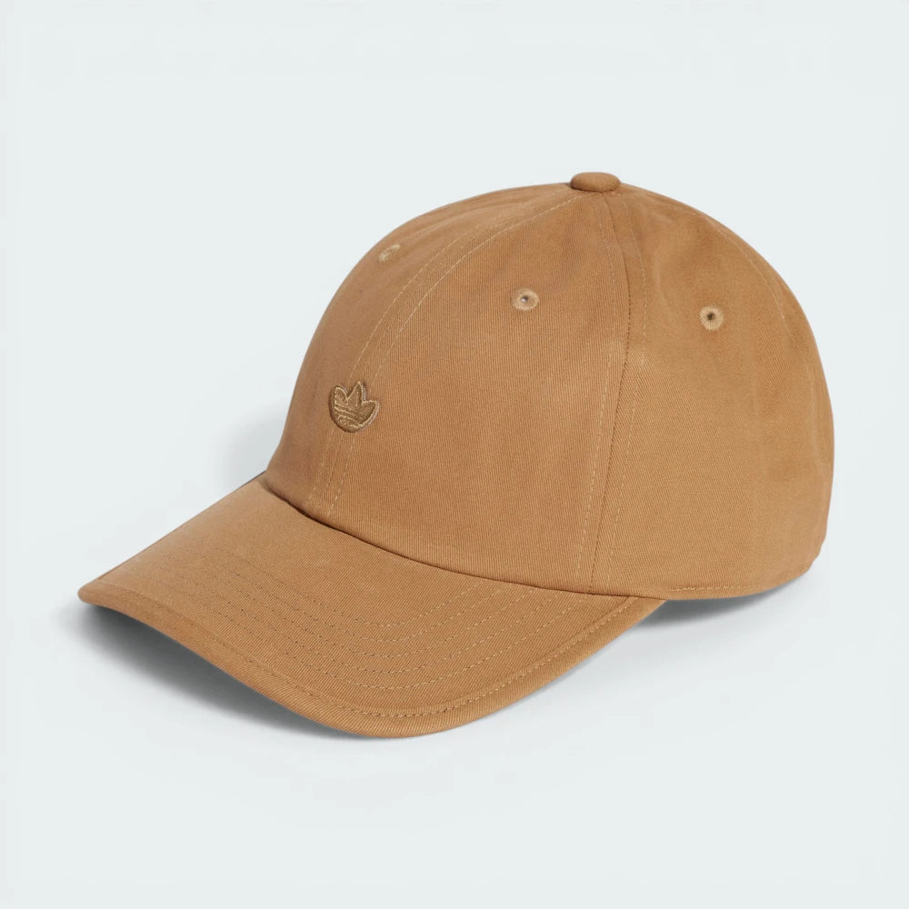 Side profile of the Cardboard brown Adidas cap, highlighting the relaxed, low-profile crown and the curved brim.