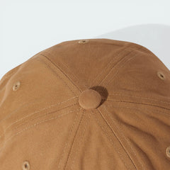 Top-down view of the cap, showcasing the six-panel construction and the rich Cardboard brown colourway.