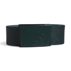 Studio product shot of the adidas Reversible Webbing Belt in Aurora Ivy and Preloved Teal, highlighting the textured webbing strap, adjustable clamp buckle with embossed adidas branding, and clean finished tip.