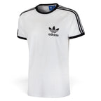 Angle View Showing Details Side by Side: Angled front-three-quarter perspective capturing the texture of the cotton single jersey, the black collar binding, and the structured raglan sleeve fit.   