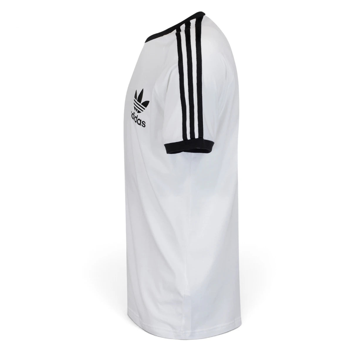 Side Profile Image: Studio lateral shot of the adidas California t-shirt in white and black, highlighting the raglan shoulder seam, black sleeve cuff, and continuous triple-stripe tape running down the arm.   