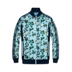 Adidas jacket with floral pattern on a light blue background