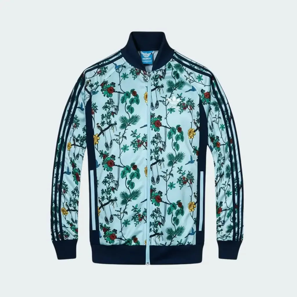 Adidas jacket with floral pattern on a light blue background