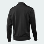 Focuses on the clean, unadorned back panel of the jacket, highlighting the sharp drop of the shoulder seams and the consistent rich tone of the black tricot fabric.
