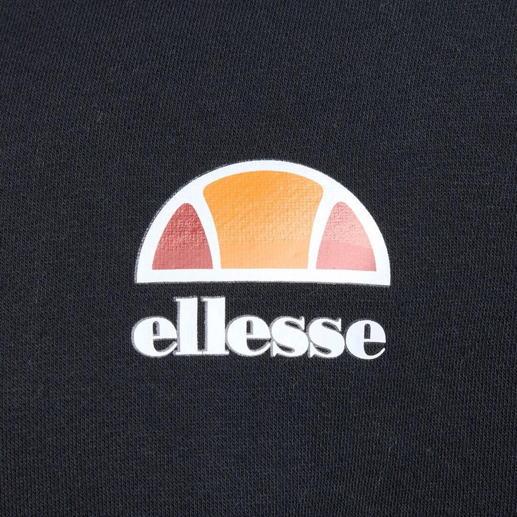 Close-up zoom on the fabric of the Ellesse Toce Overhead Hoodie in black, showing the soft fleece texture and the embroidered or printed Ellesse logo.