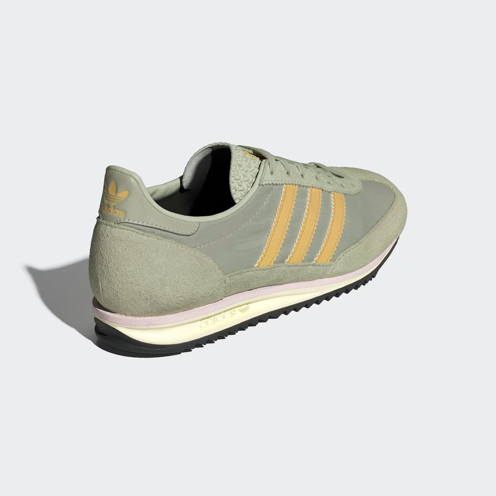 Focusing on the Almost Pink heel tab and the streamlined, narrow heel construction.