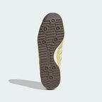 The classic "Super Light" traction pattern on the low-profile rubber sole, showcasing the vintage gum or off-white finish.