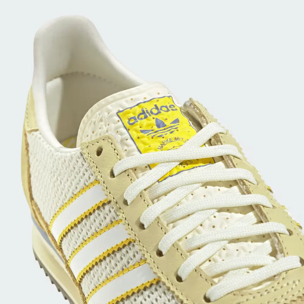 A close-up of the fine nylon weave and the precision-stitched suede and printed tongue.