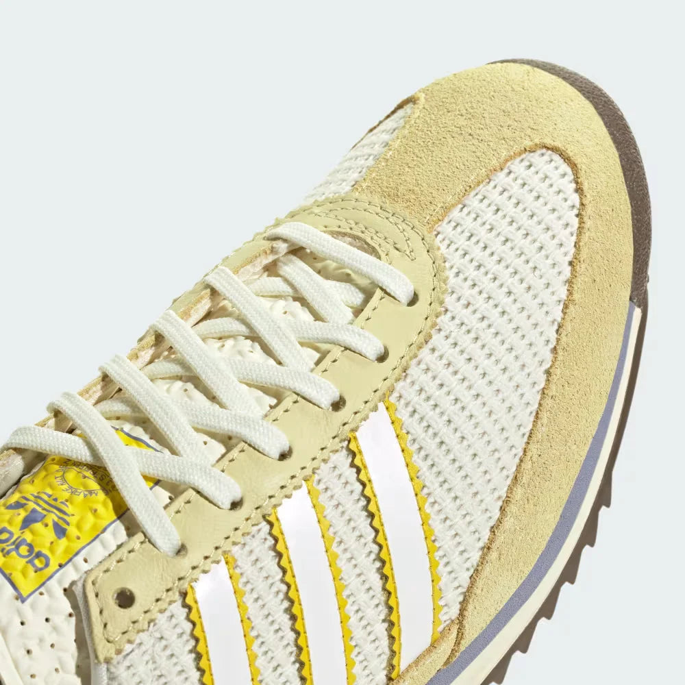 A close-up of the fine nylon weave and the precision-stitched suede reinforcements around the toe box.