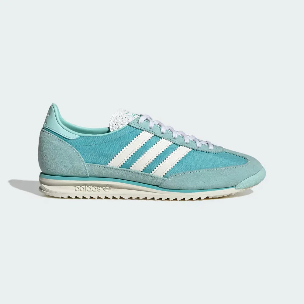 The Easy Mint SL 72 OG, highlighting the slim profile and the vibrant Semi Flash Aqua Three-Stripes against the mint nylon.