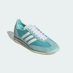 Emphasising the contrast between the mint nylon and the premium aqua suede overlays.
