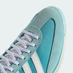 A close-up of the fine nylon weave and the precision-stitched suede reinforcements around the toe box.
