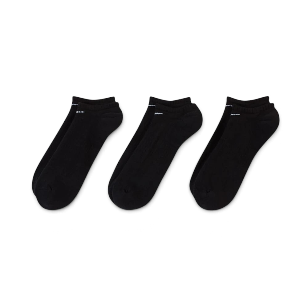 Looking down at the three pairs laid out, showcasing the sleek, non-bulky knit and the anatomical shape.