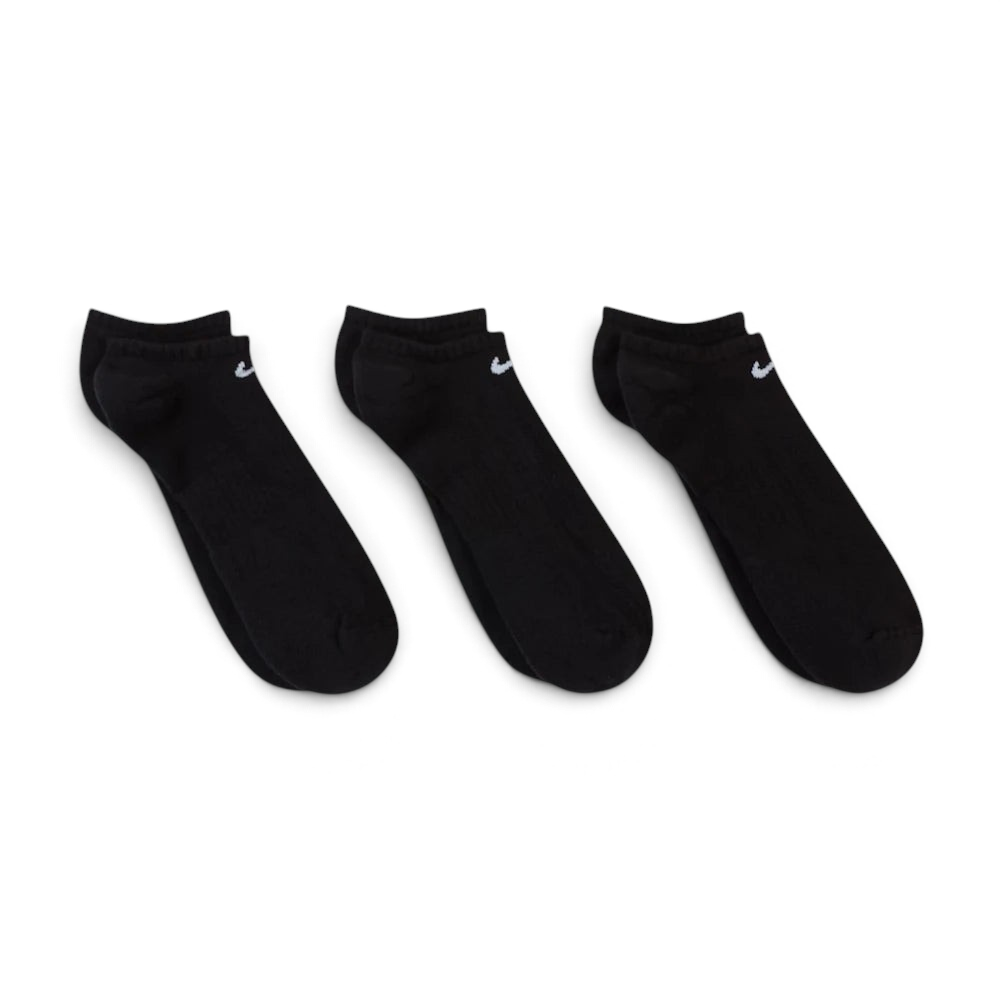 Looking down at the three pairs laid out, showcasing the sleek, non-bulky knit and the anatomical shape.