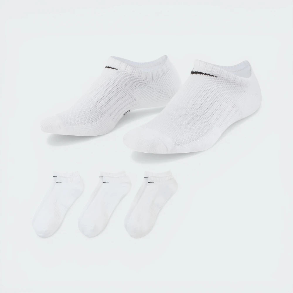 The white no-show sock, highlighting the high-contrast black Nike Swoosh on the top of the foot.