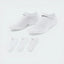 The white no-show sock, highlighting the high-contrast black Nike Swoosh on the top of the foot.