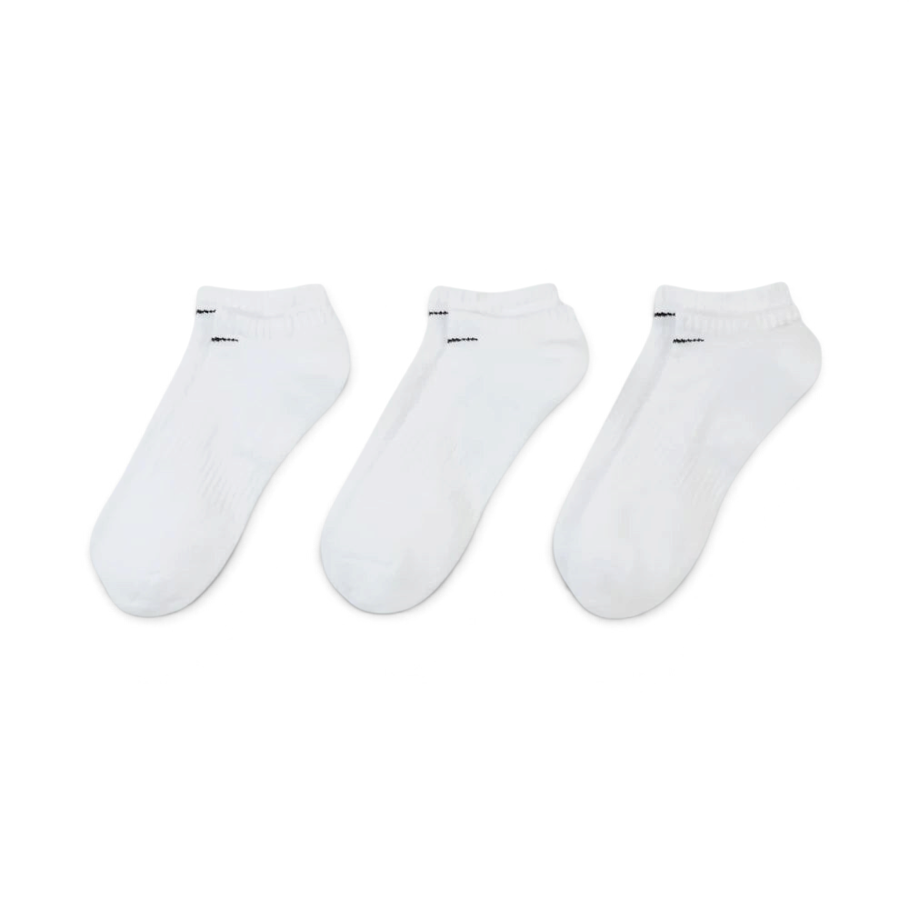 Looking down at the three pairs laid out, showcasing the uniform white knit and the ribbed arch band detail.