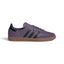 Side Profile Image: Studio lateral shot of the adidas Samba OG in Shadow Violet and Carbon, highlighting the textured purple tumbled leather upper, black serrated three stripes, gold foil SAMBA lettering, and the classic gum rubber outsole.   