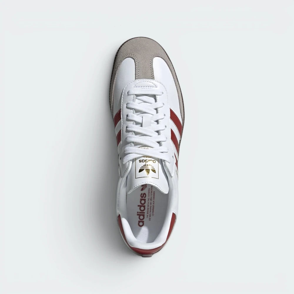 Focuses on the tidy lace closure, the high-definition texture of the Clear Granite suede toe overlay, and the clean branded insoles.