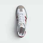 Focuses on the tidy lace closure, the high-definition texture of the Clear Granite suede toe overlay, and the clean branded insoles.