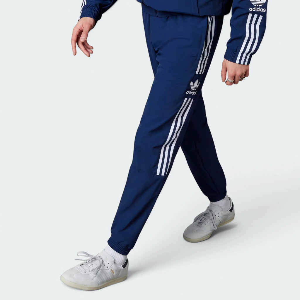 Details the premium seamless dual-stitching lines tracing the soft leather toe cap and the precision eyelet alignment.