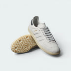 Displays the classic pivot-point geometric traction pattern of the gum rubber outsole, engineered for unreal everyday multi-surface street grip.