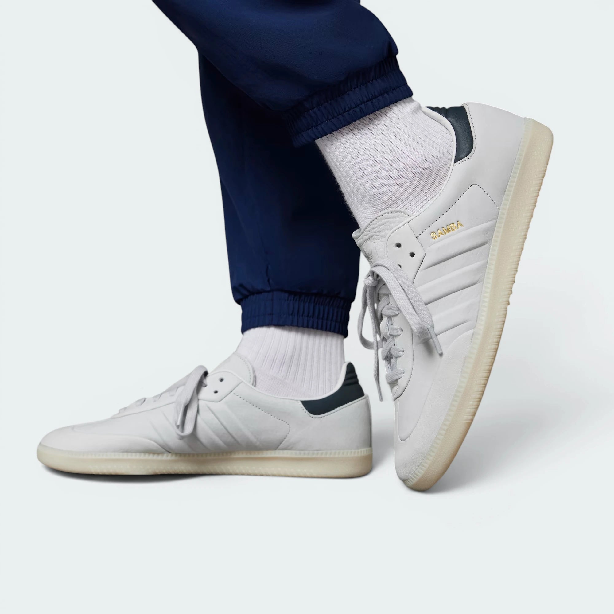 Emphasising the low-profile casual silhouette and the professional harmony of the neutral grey and alumina tones.
