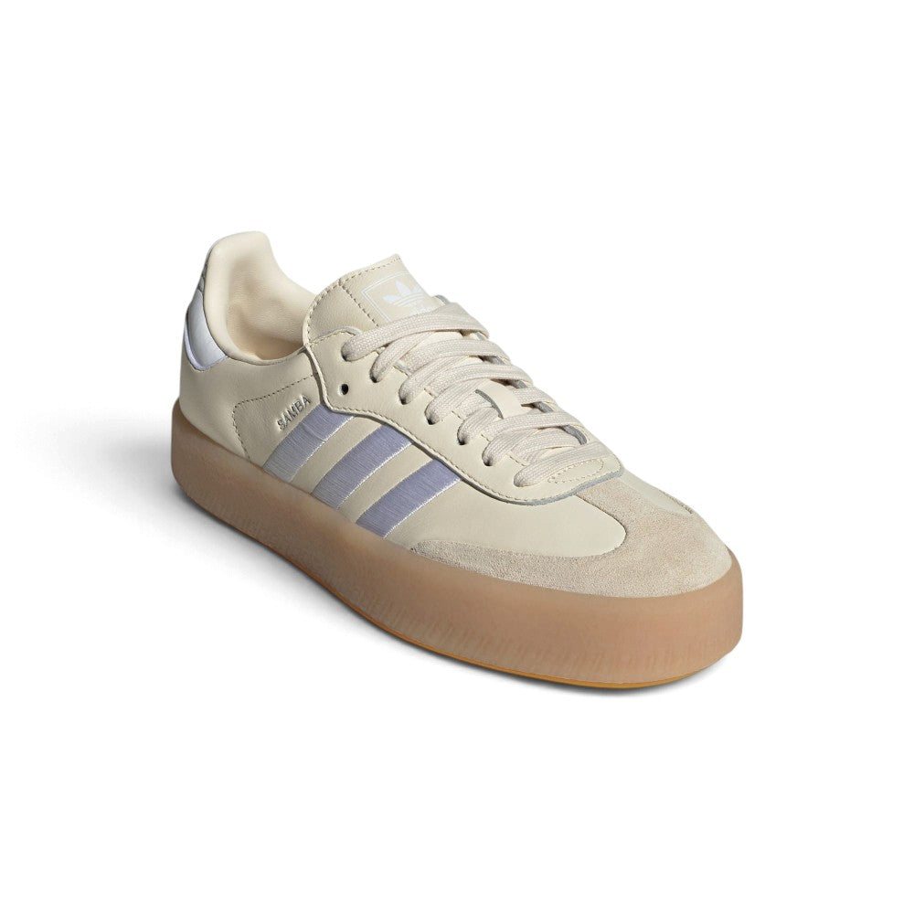 Angle View Showing Details Side by Side: Angled front-three-quarter perspective capturing the reinforced suede T-toe overlay, smooth leather side panels, and stitched white stripes.   