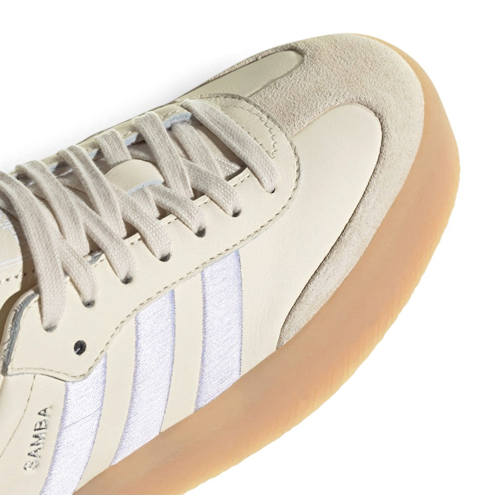 Zoom Looking at the Front of the Shoes and Laces: Macro focus on the suede T-toe mudguard overlay, leather eyestays, and matching flat laces.   