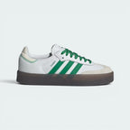 Highlights the high-velocity sweep of the Green embroidered 3-Stripes, the professional look of the leather panels, and the striking visual grid of the exaggerated gum rubber platform outsole.