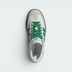 Focuses on the locked-in lace closure layout, the clean multilingual text alignment on the tongue, and the symmetry of the off-white toe overlays.
