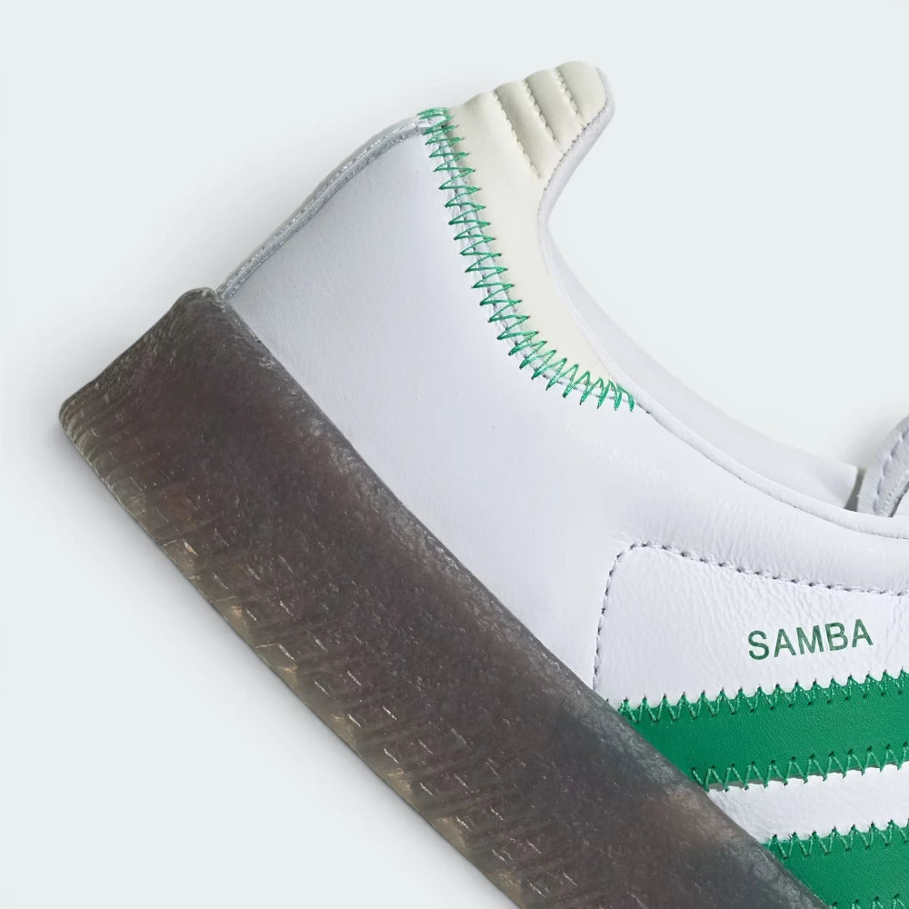 Highlights the "unreal" textured finish of the stacked gum rubber walls and its robust, clean bonding to the white upper leather.