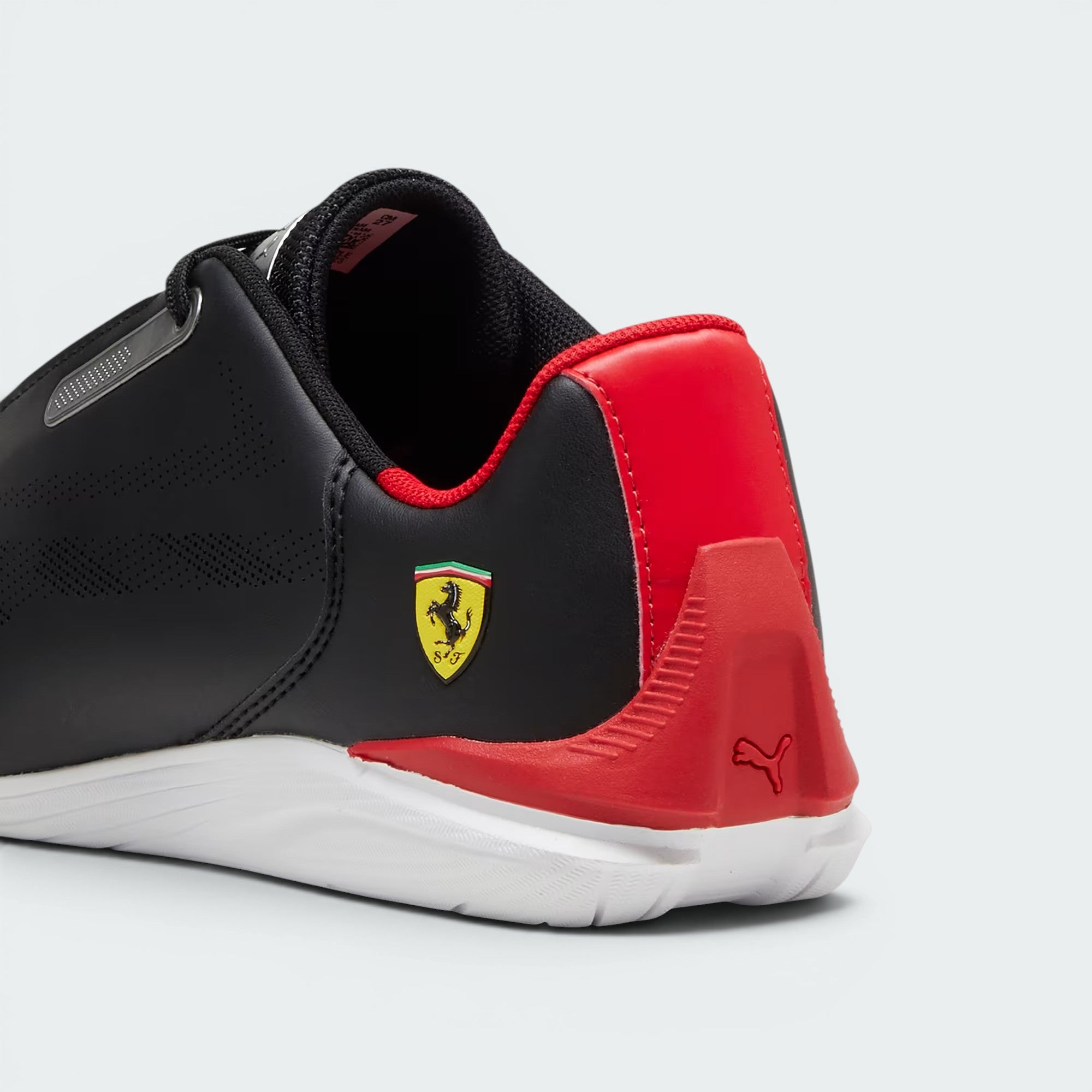 Focuses on the sleek motorsport-inspired heel wrap and the professional branding.
