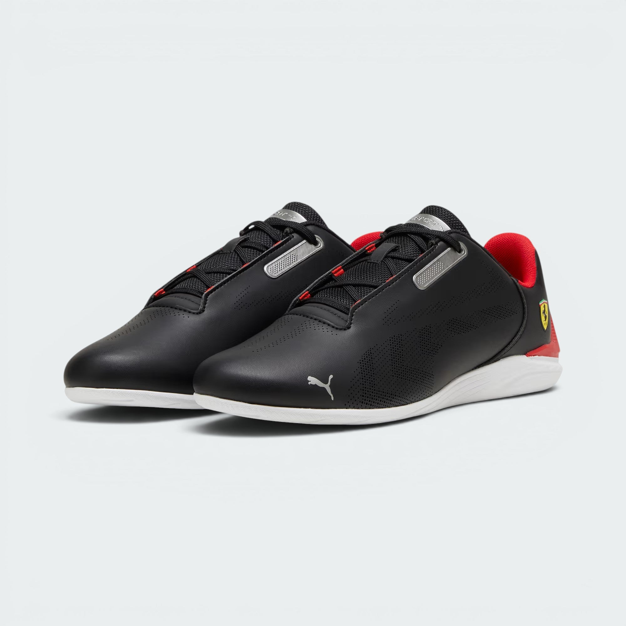 Emphasising the locked-in low-cut collar and the professional "PUMA Black" colour depth.