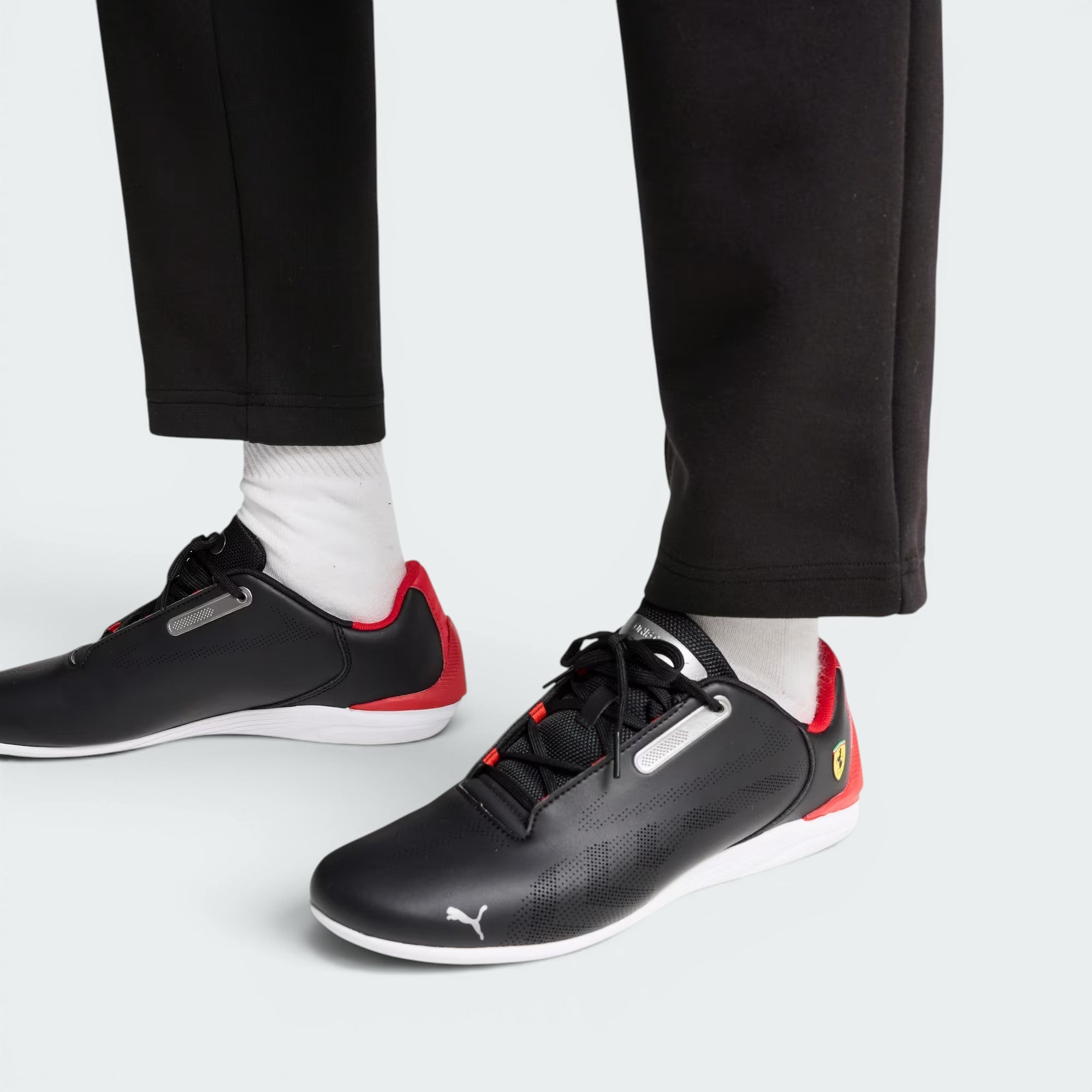 Details the high-definition synthetic grain and the precision of the perforation.