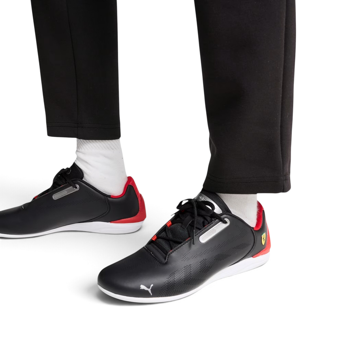 Details the high-definition synthetic grain and the precision of the perforation.